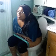 A chubby, mixed Asian girl records herself farting and taking a shit while sitting on a toilet at her home. Audible pooping. Presented in 720P HD. Over 3 minutes.
